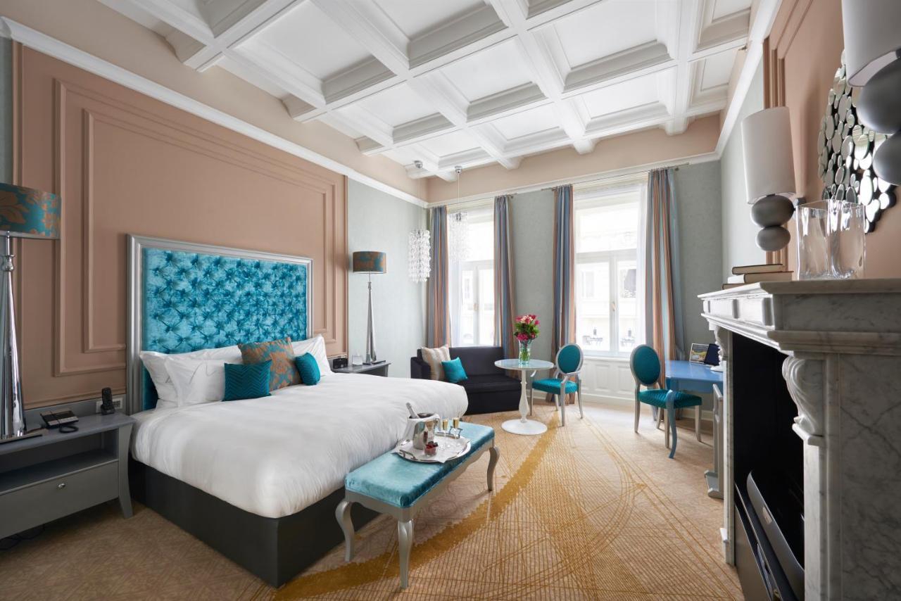 Zimmer mit Kingsize-Bett und Sofa - Aria Signature